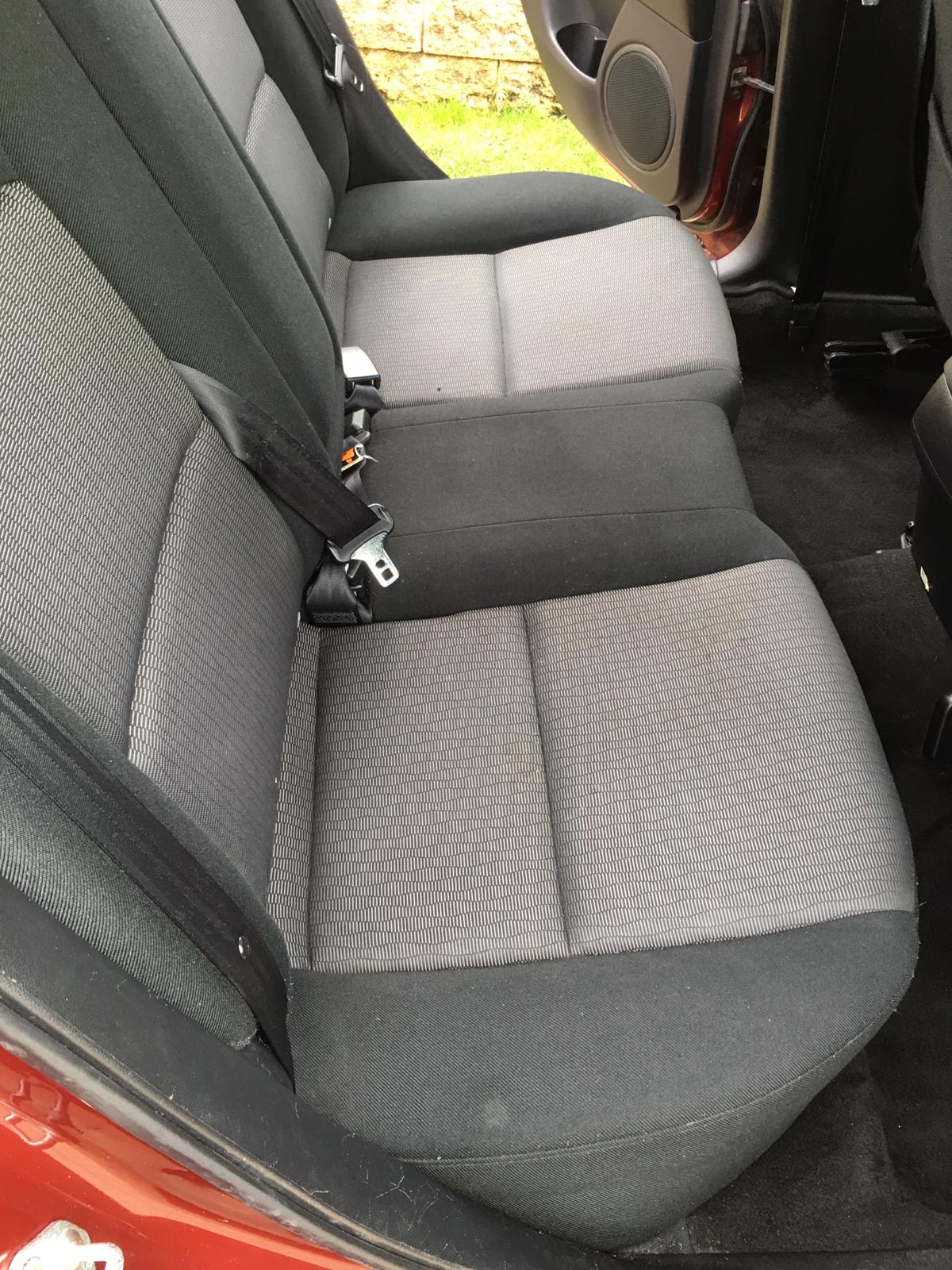 picture showing after a car seat was cleaned with mold 